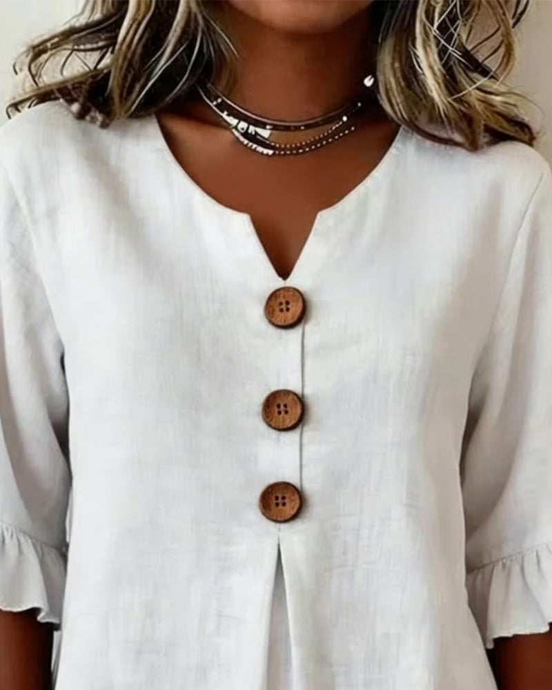 Sophia Blusas lisas de algodón y lino con botones de madera y volantes.