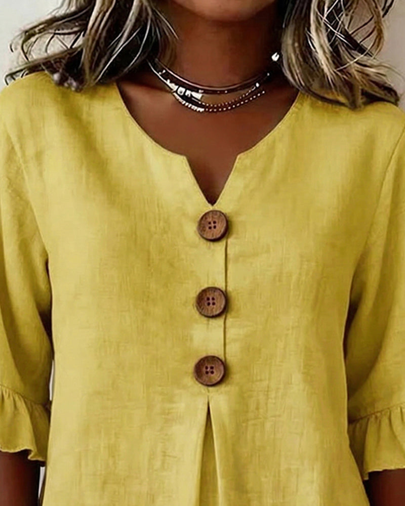 Sophia Blusas lisas de algodón y lino con botones de madera y volantes.