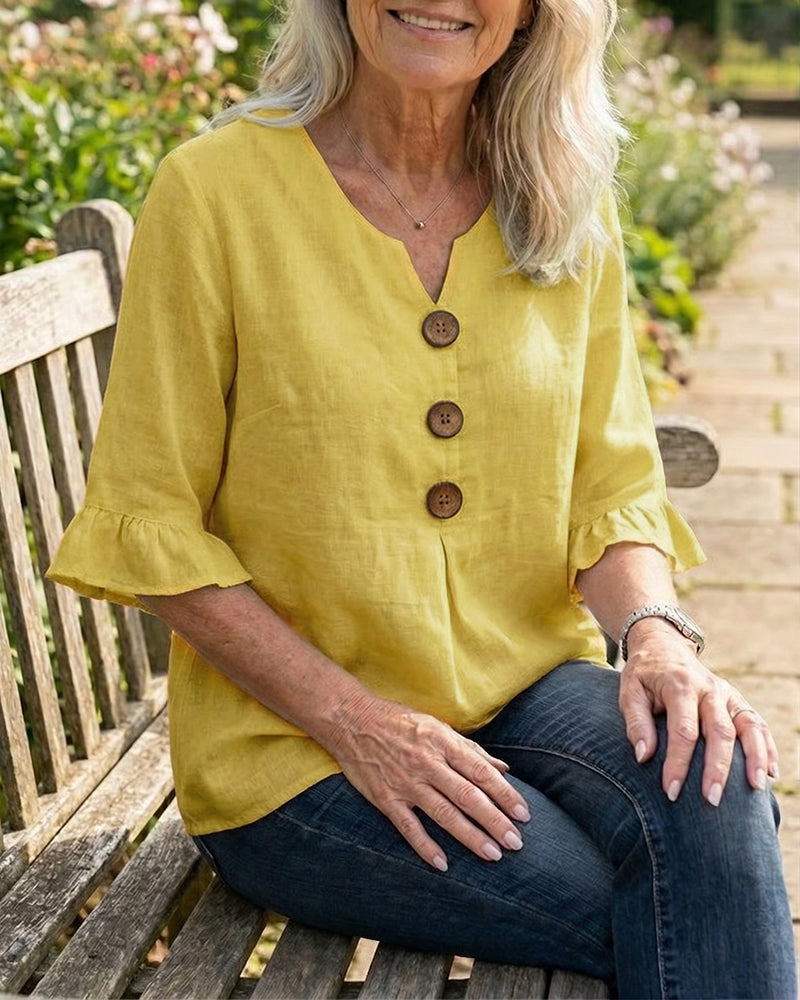 Sophia Blusas lisas de algodón y lino con botones de madera y volantes.